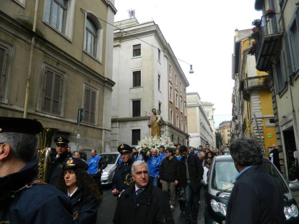 St Joseph is carried high through the streets of Monti