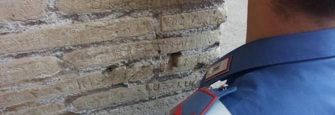 Tourist defaces Colosseum with graffiti