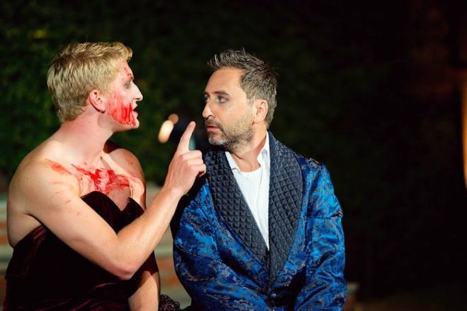 ouglas Dean (right) as Claudius in a 2014 UK production of Hamlet, with Harry Livingstone in the title role. 