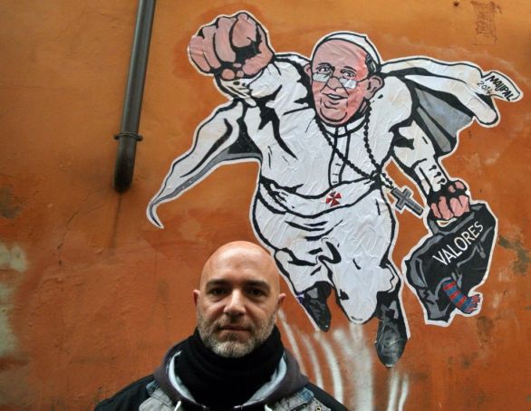 Maupal in front of his Super-Pope image in 2014