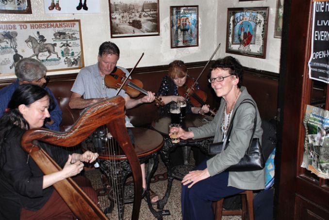 Mary Pyne, far right, enjoying some traditional Irish music.