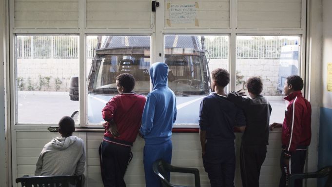 A group of young Eritreans at a migrant reception centre in Pozzallo, Sicily.