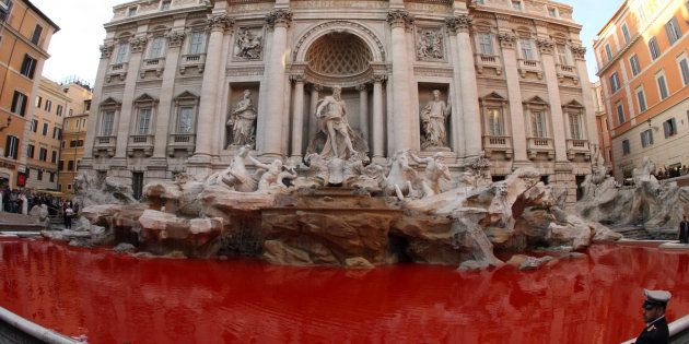 Activist dyes Trevi Fountain waters red