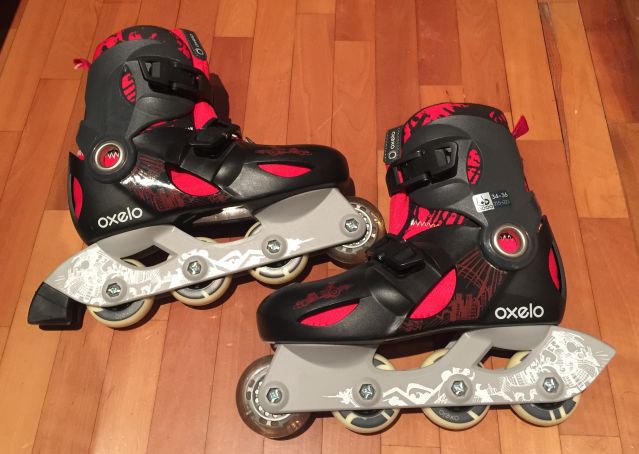 Black and red child rollerblades