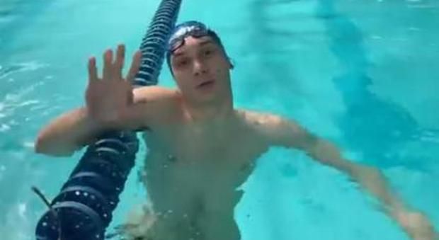 Swimmer paralysed in Rome shooting returns to pool