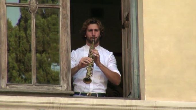 Rome musicians perform free concerts from theatre windows