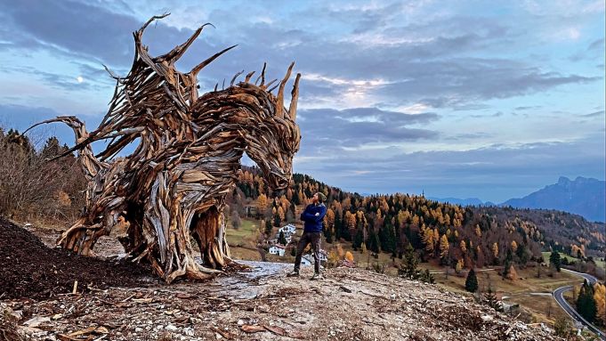 In Italy, a giant dragon rises from a lost forest