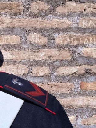 US tourists caught carving initials on Colosseum - image 1