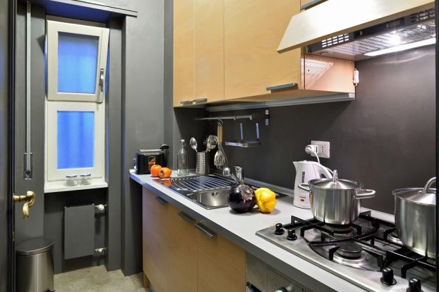 1-bedroom flat (behind FAO) with large patio - image 4