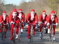 Santa Clauses on bicycles in Rome