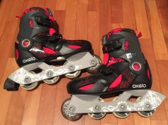 Black and red child rollerblades