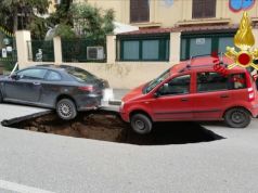 Sinkhole opening on Rome street