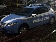 Rome police car stuck on train tracks