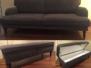 Dark gray couch + storage foot stool
