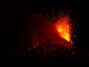Italy’s Mount Etna volcano spews lava into night sky