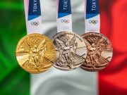 Italy ends Olympics with record 40 medals