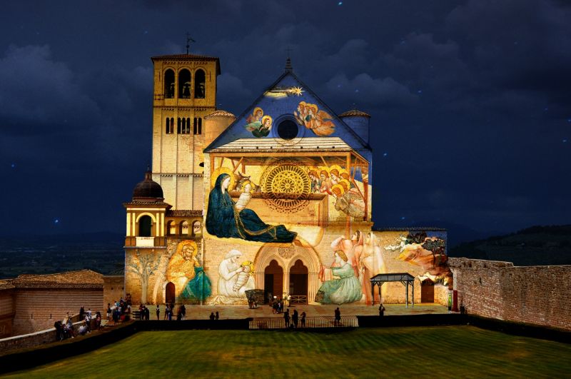 Italy Assisi lights up Basilica with Giotto frescoes for Christmas