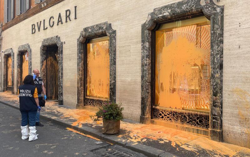 Climate activists deface luxury fashion shops in Rome image